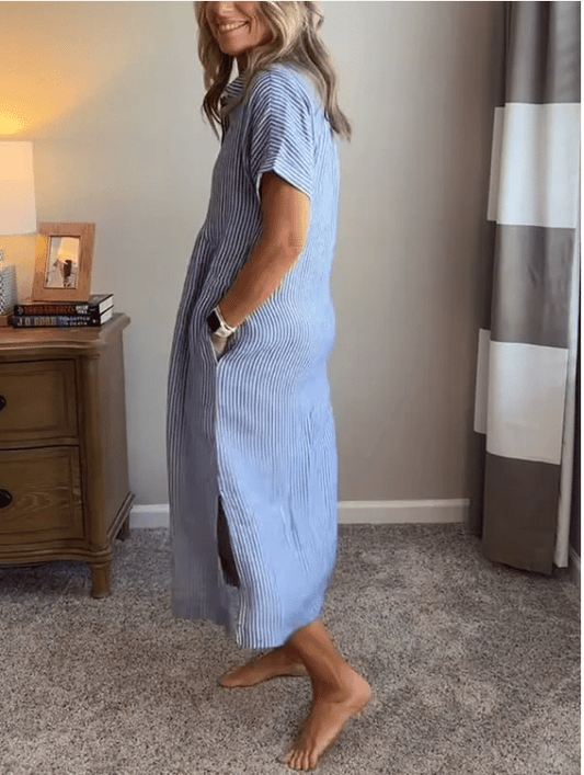New button-up dress with striped flaps at the bottom | With functional pockets